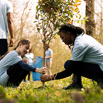 Volunteers planting trees.